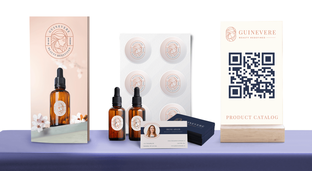 Tabletop trade show materials - brochures, stickers, QR code, and business cards.